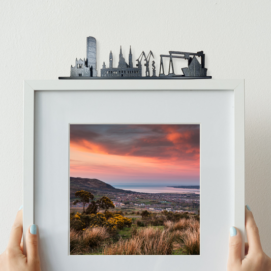 Belfast landscape ornament made from recycled plastic on top of picture frame