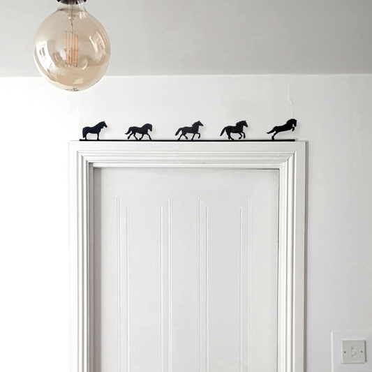 Fell Pony ornament made from recycled plastic displayed on top of a door frame