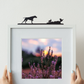 German Pointer flushing grouse ornament made from recycled plastic displayed on top of a picture frame
