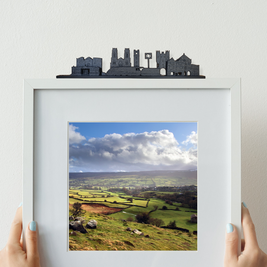 York skyline ornament made from recycled plastic displayed on top of a picture frame